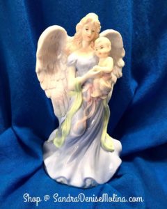 Angel With Child ($25) Porcelain; Height Approx. 8 in